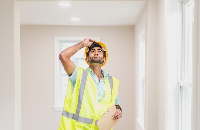 A contractor inspecting a home.