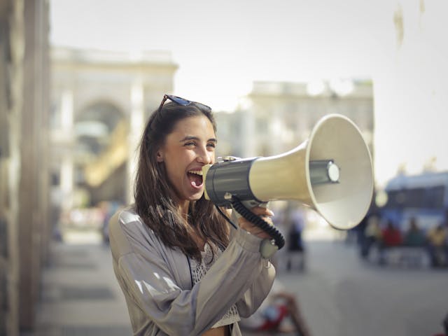 A person with a megaphone.